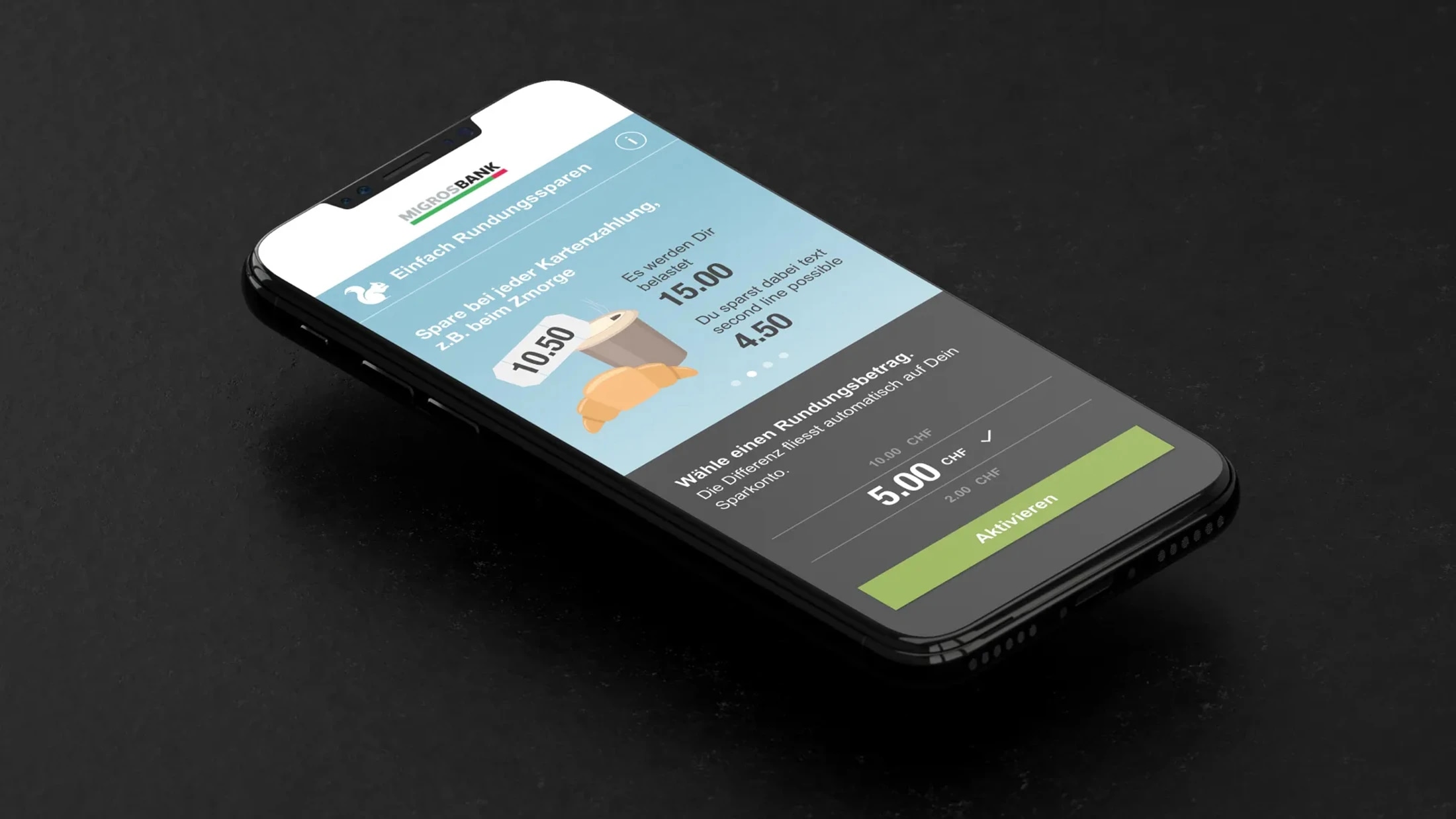Das Bild zeigt ein Smartphone, das auf einer dunklen Oberfläche liegt und eine Finanz-App der Migros Bank anzeigt. Hier sind die Details: